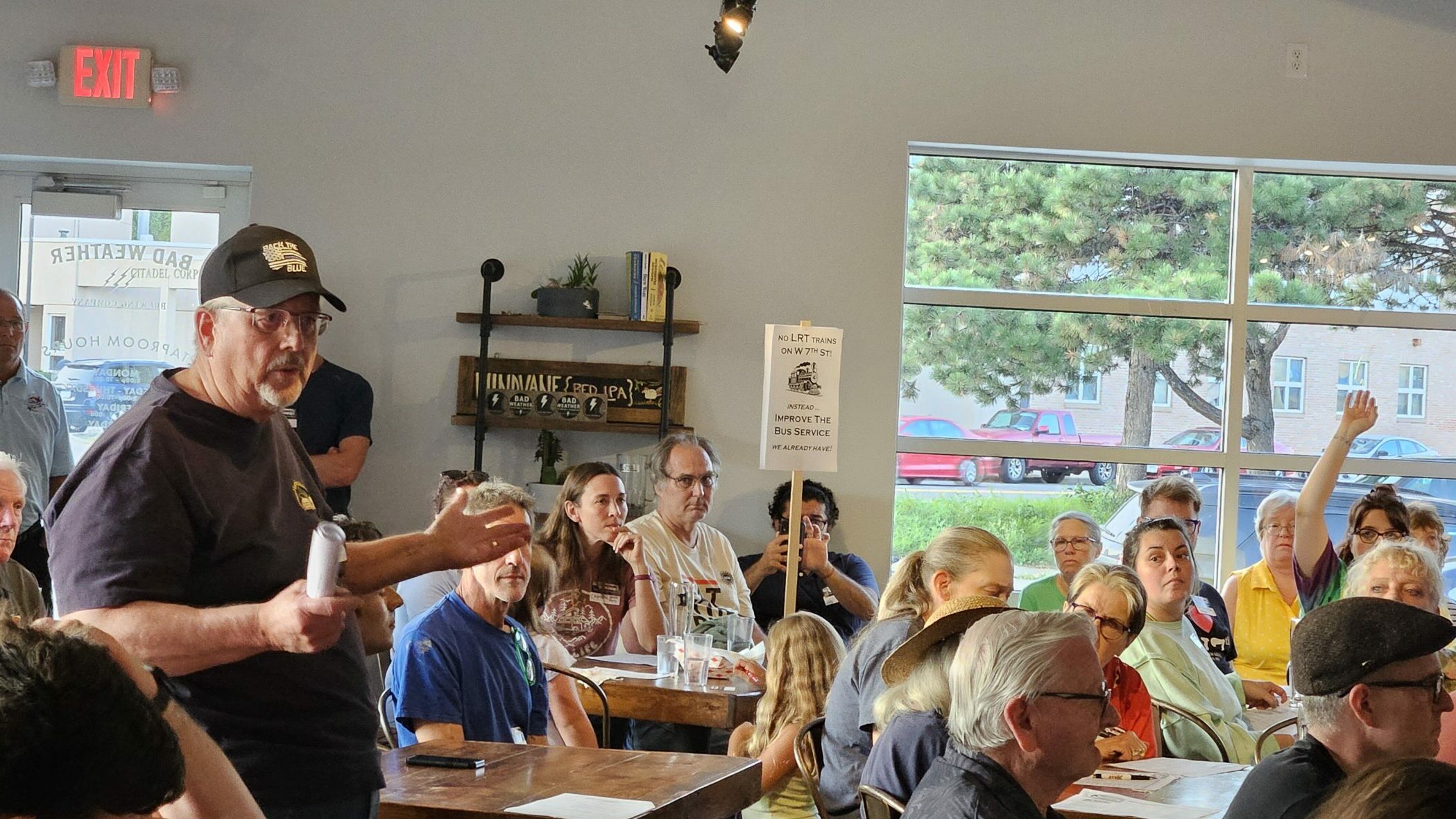 Neighbors Rally Against Rail on West 7th