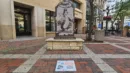 A Hidden Herald play located near the Hamms statue on West 7th Pl.