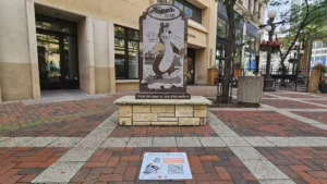 A Hidden Herald play located near the Hamms statue on West 7th Pl.