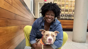 Korinne Dennis and one of her dogs.