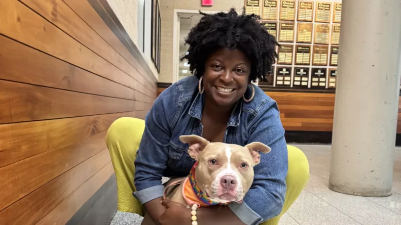 Korinne Dennis and one of her dogs.