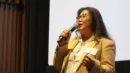 State Rep Kaohly Her speaking into a microphone.