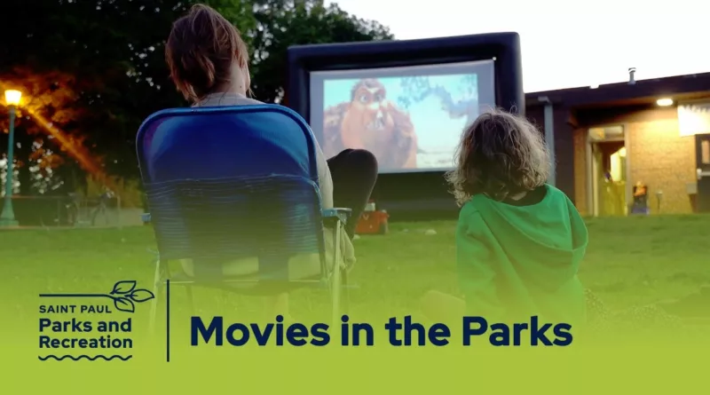 A family enjoying a movie in a St. Paul park.