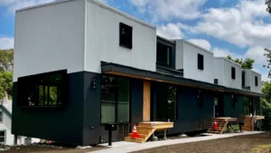 A new co-living duplex in St. Paul, where each unit will have six bedrooms and six bathrooms. Credit: MinnPost photo by Bill Lindeke