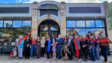 Good Things owner Tyler Conrad, center, celebrates the expansion of their Grand Avenue storefront on October 9, 2025.