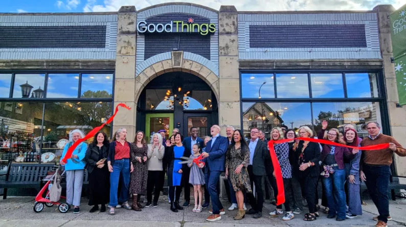 Good Things owner Tyler Conrad, center, celebrates the expansion of their Grand Avenue storefront on October 9, 2025.