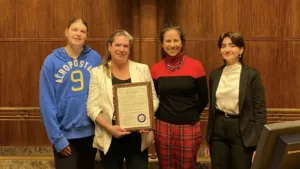 Council Member Rebecca Noecker and the owners of Lost Fox pose with their St. Paul Business Award.