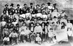 Christ Stahlman seated at center with child & brewery workers, 1870. Credit: MNHS